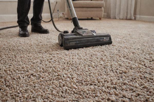 Professional carpet cleaning equipment in residential setting